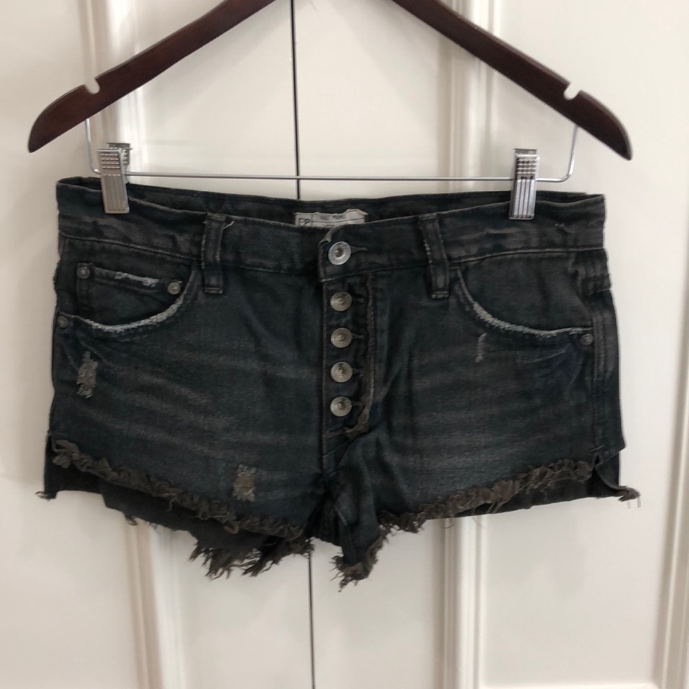 Free People black denim cut off fringe jean shorts